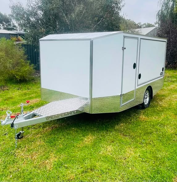 White custom toy hauler exterior